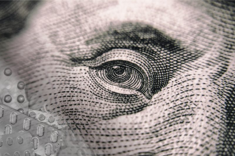 close up of ben franklin eye from 100 dollar bill